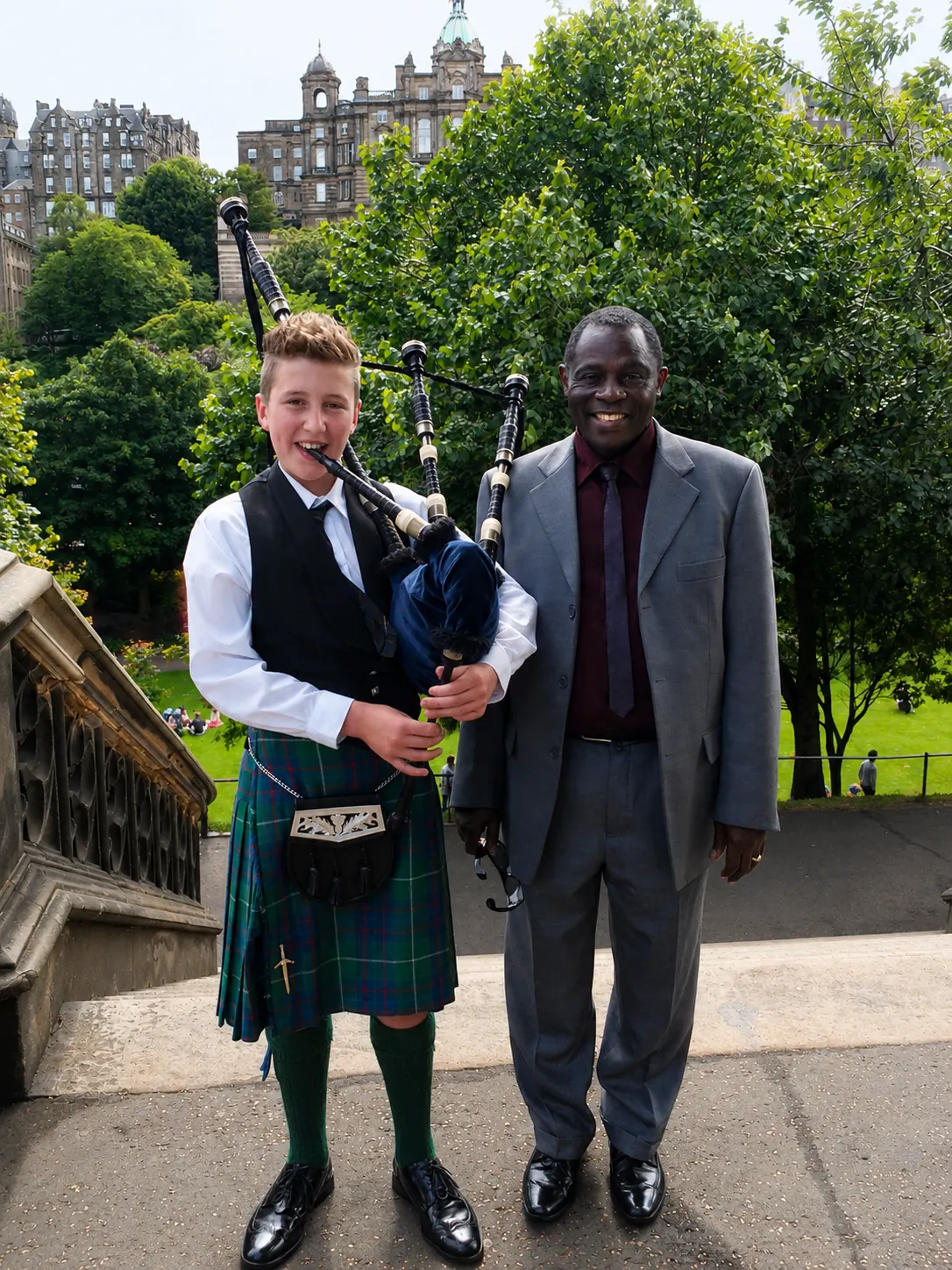 ICCF community member with a young piper in Edinburgh